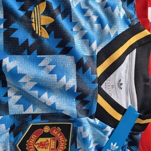 adidas Blue and Black Geometric Manchester United Jersey with Gold Trim